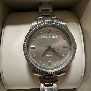 Women’s Stuhrling stainless steel watch with diamonds